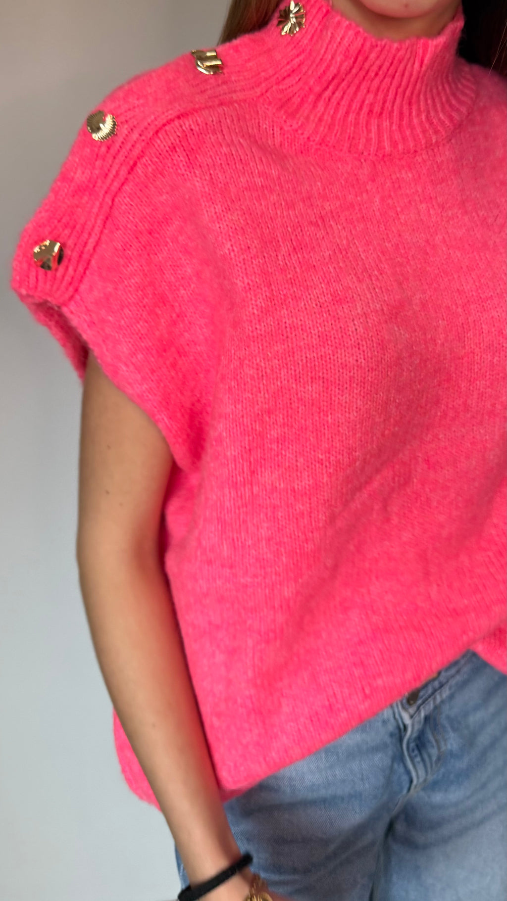 pull détails doré